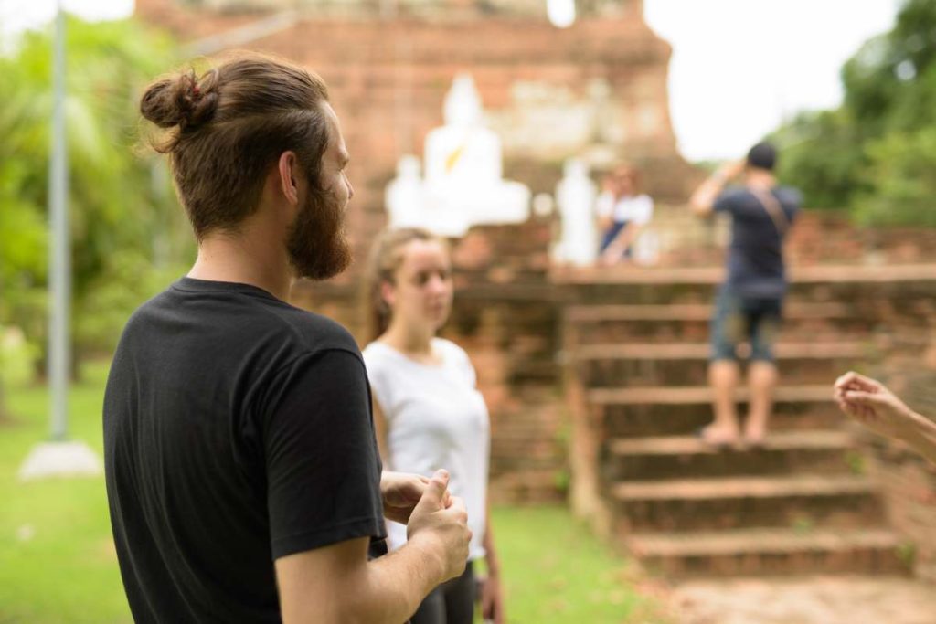 Portrait of young tourist couple having vacation together in Ayutthaya, Thailand