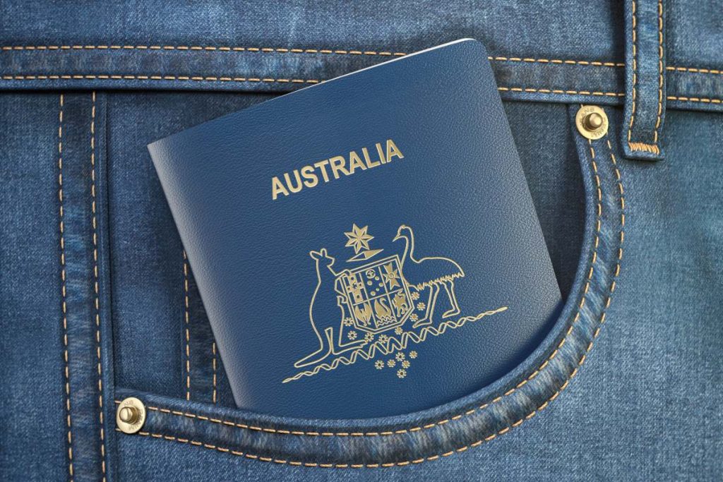 Passport of Australia in pocket jeans. Travel, tourism, emigration and passport control concept. 3d illustration