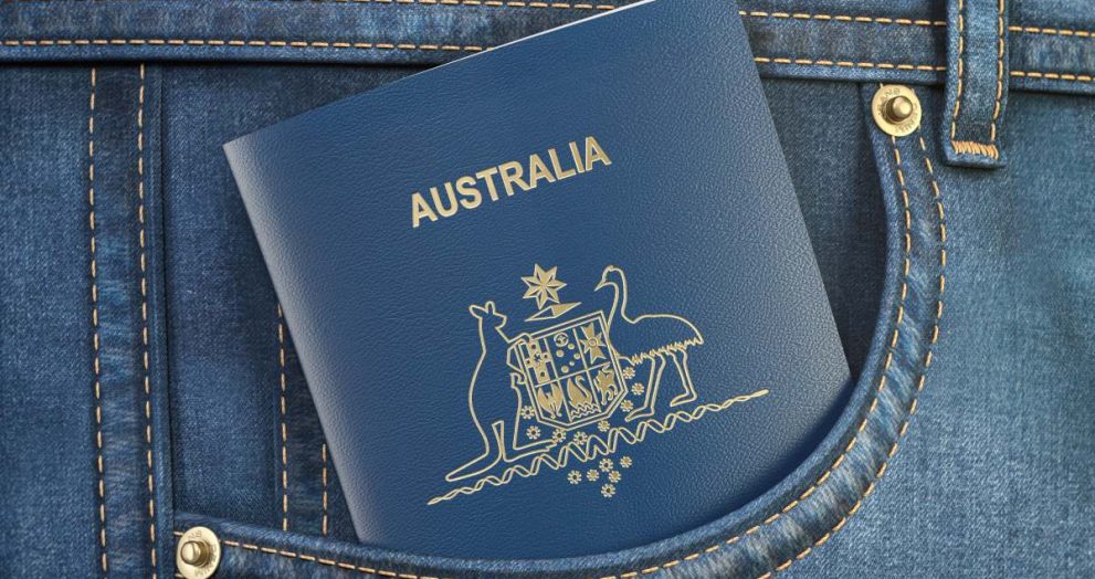 Passport of Australia in pocket jeans. Travel, tourism, emigration and passport control concept. 3d illustration