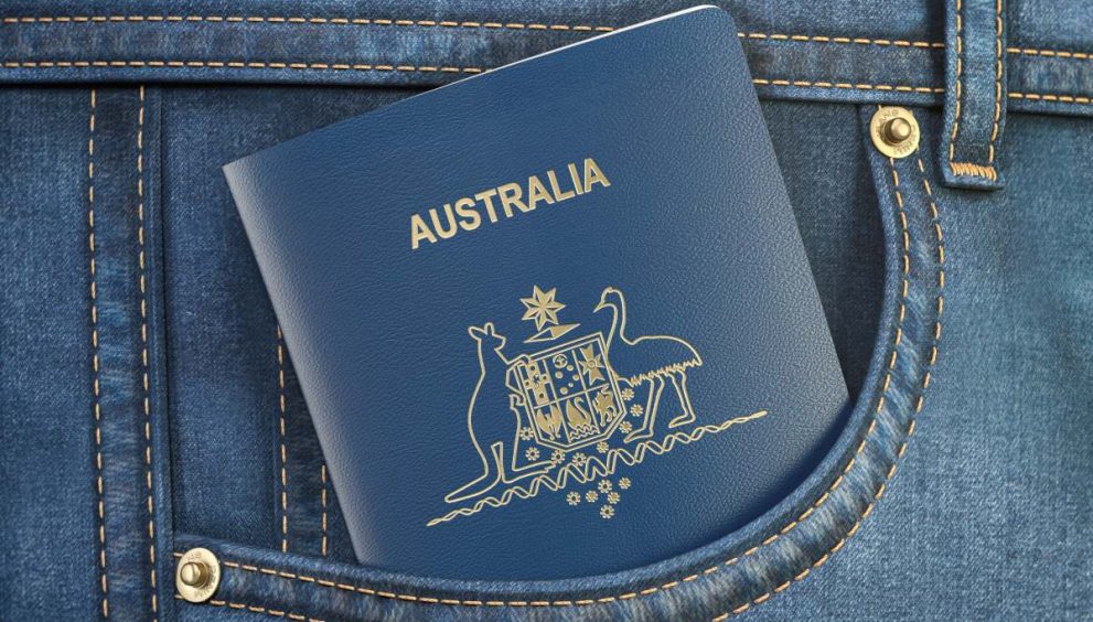 Passport of Australia in pocket jeans. Travel, tourism, emigration and passport control concept. 3d illustration