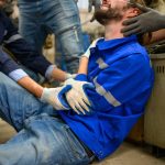 Engineer worker with accident at factory