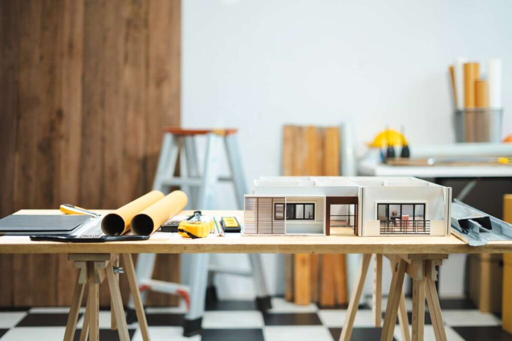 Profession concept with architect desk and tools on a wooden table. Architect concept.